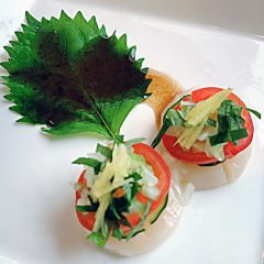 Scallop amuse with flavored vegetables and Japanese style sauce